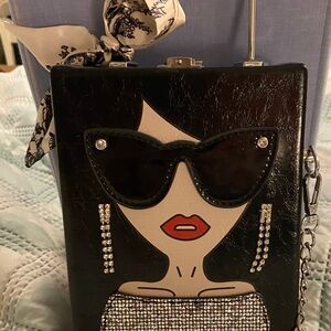 Novelty handbag perfect for the night out. Dress up or down.